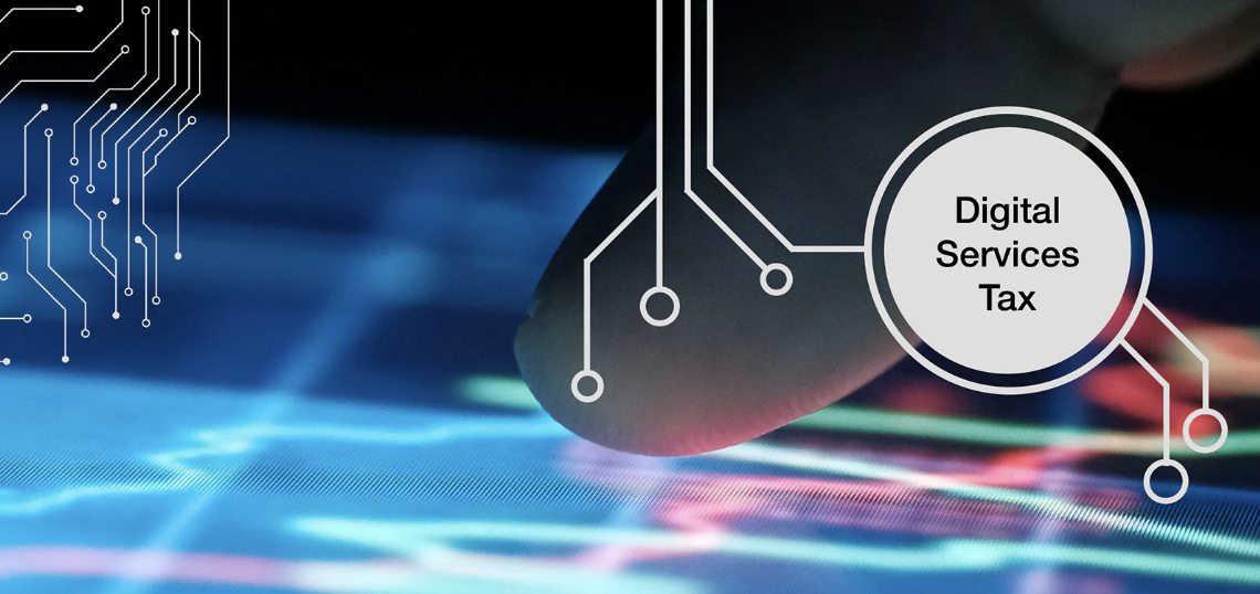 Concept image showing digital circuits converging on a circular label that reads 'Digital Services Tax'